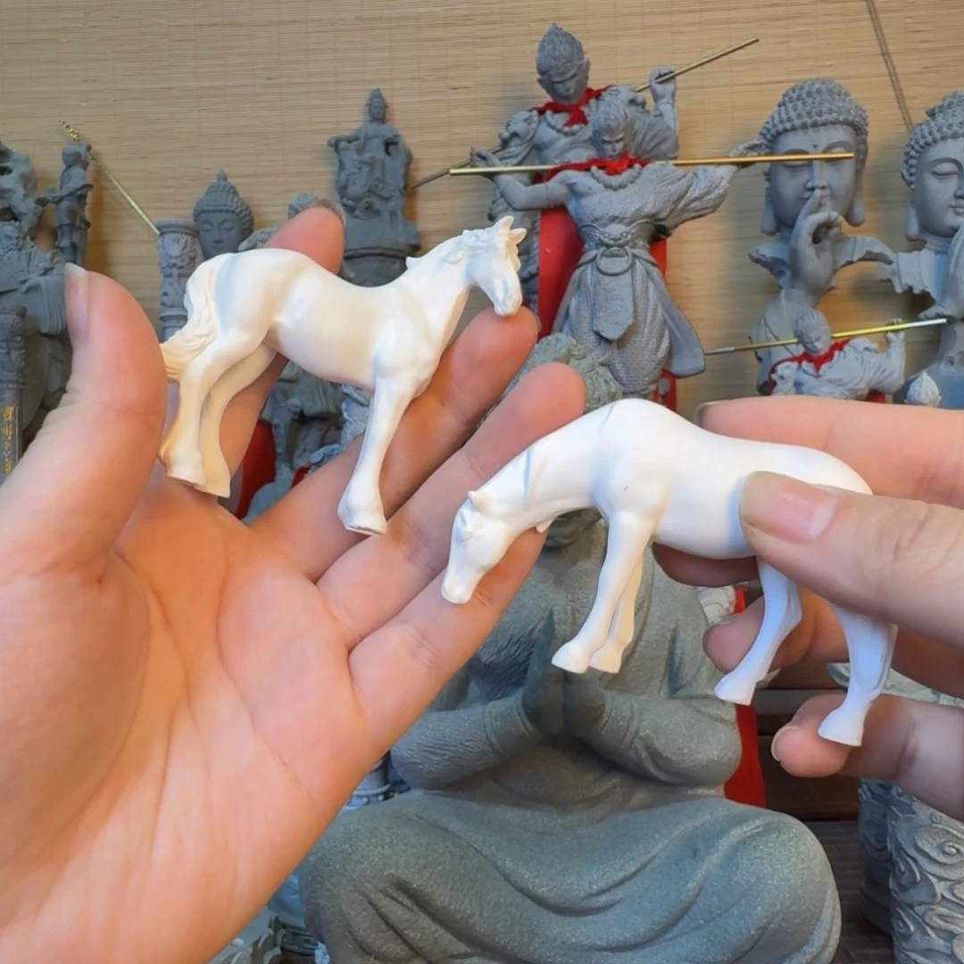 石材站马和低头马白云石