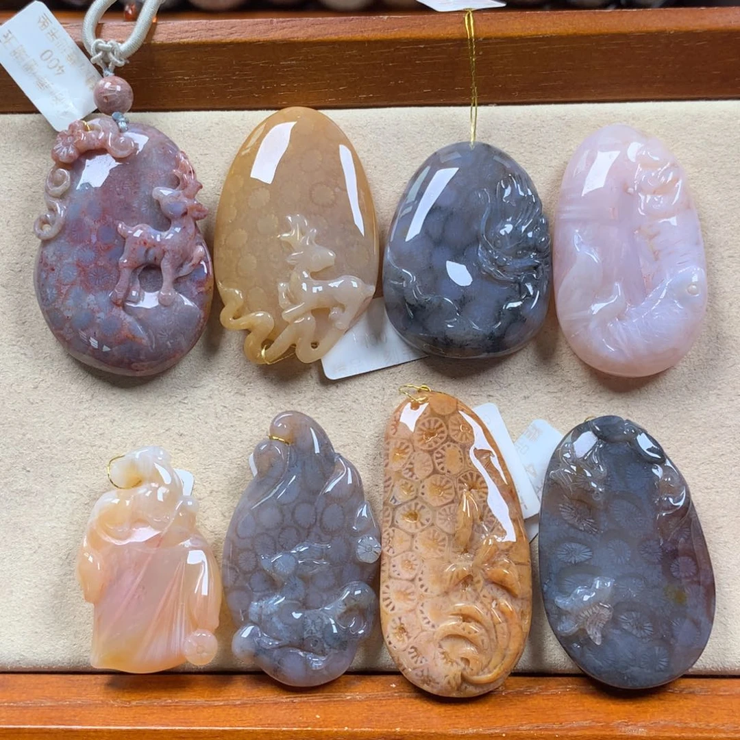 未镶嵌雕刻吊坠漏200/个，可挑。09硅化珊瑚（珊瑚玉）