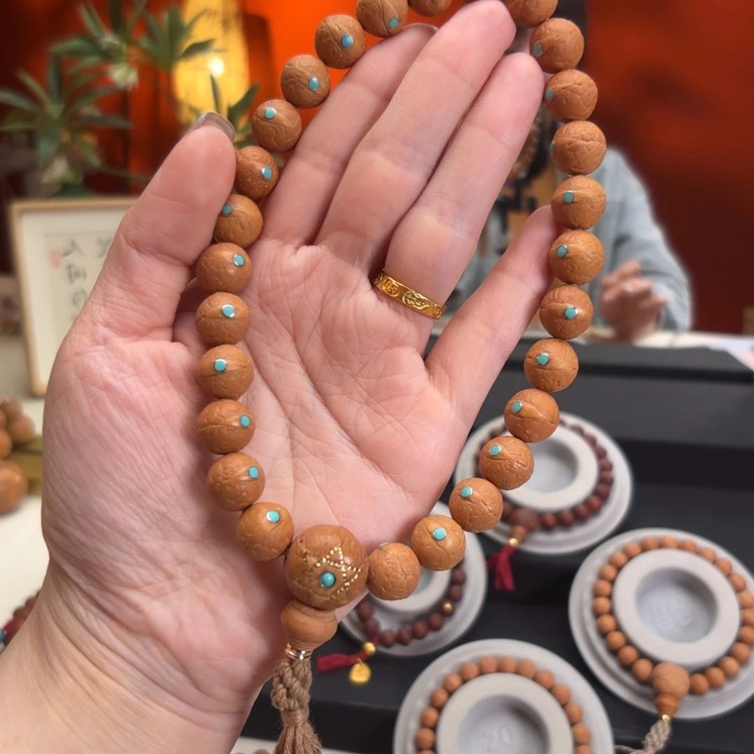 凤眼菩提吊坠12毫米手持27颗松