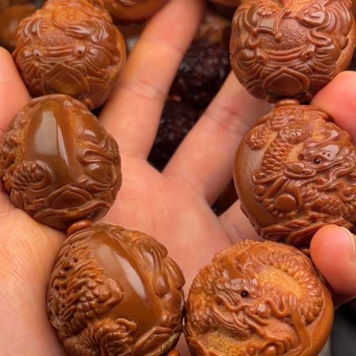 八***哥橄榄核吊坠橄榄核