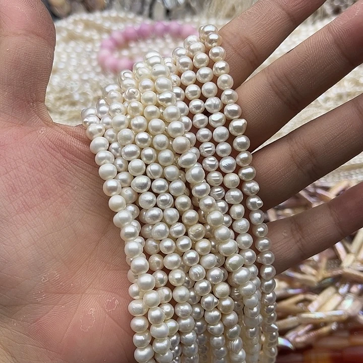 玛瑙/玉髓未镶嵌珠宝半成品一条5.5mm左右椭圆珍珠有生长纹