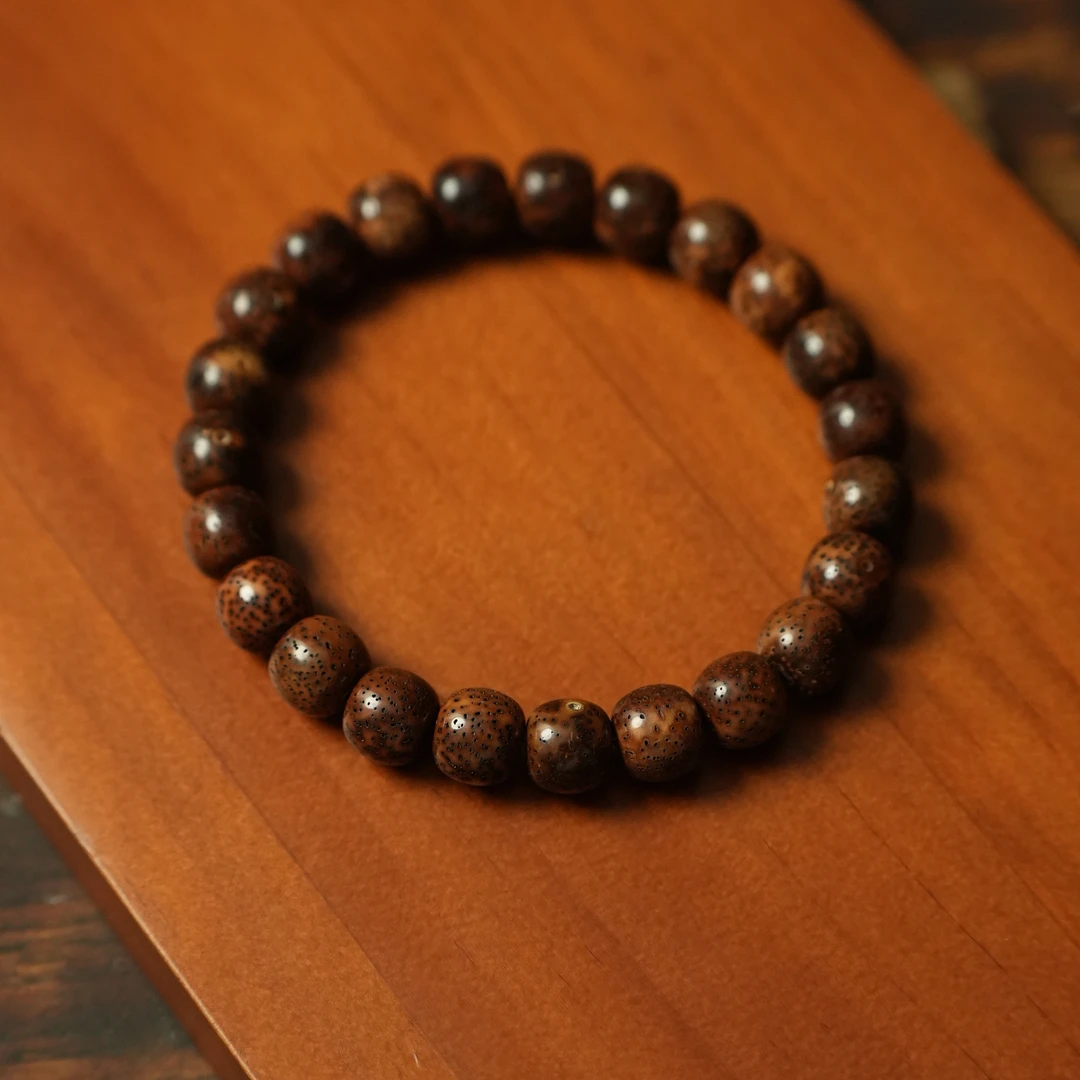 酸儿文玩·精工级深珀星月老陈籽桶珠10*9手串（多样性发货）