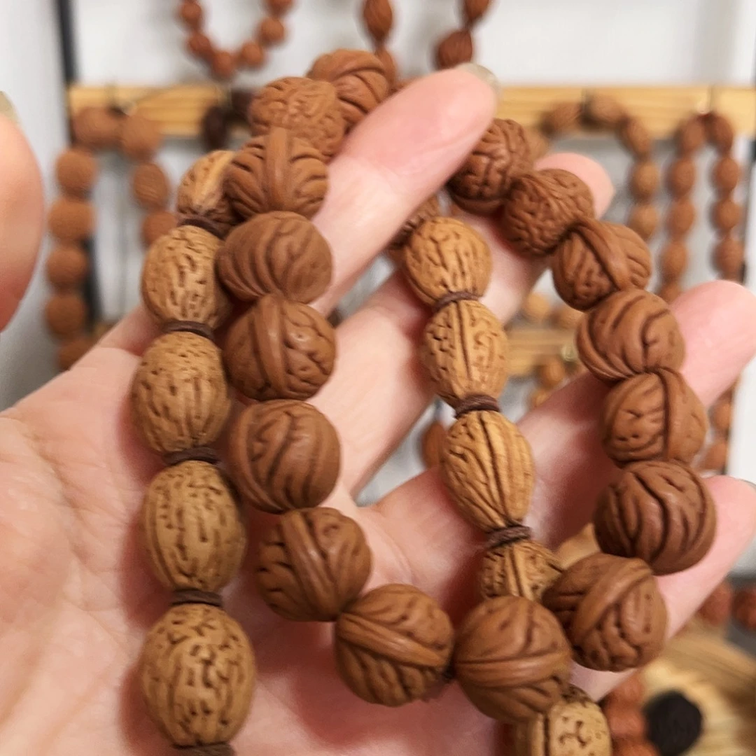 Y***涌野生桃枭小籽手串