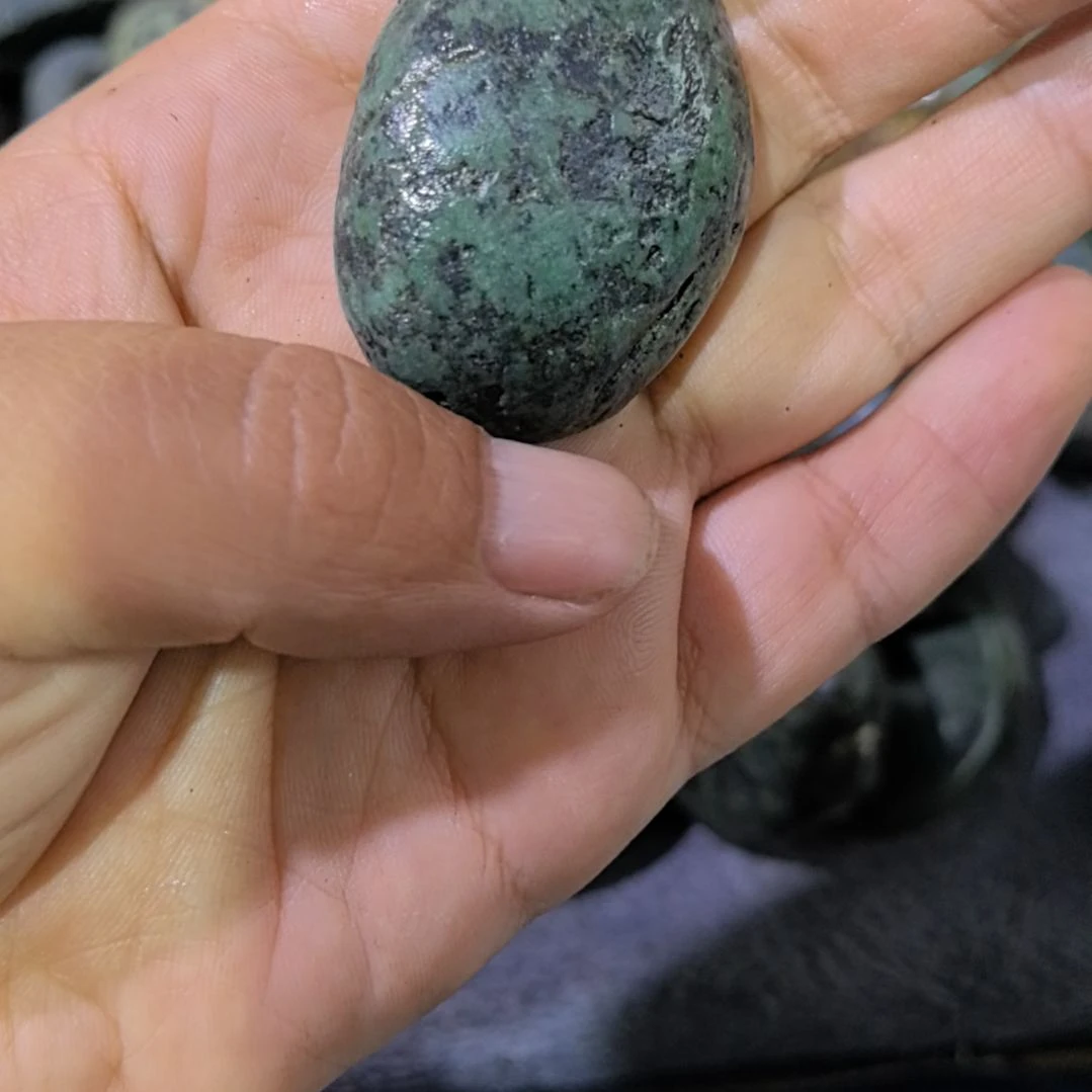 睛***理有机玻璃藏玉药王石原石手把件一个