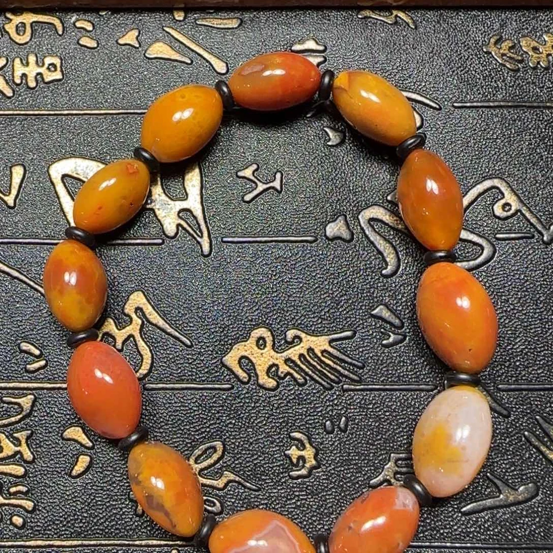 南红玛瑙未镶嵌蒲缥鸡油黄随型12-13 mm