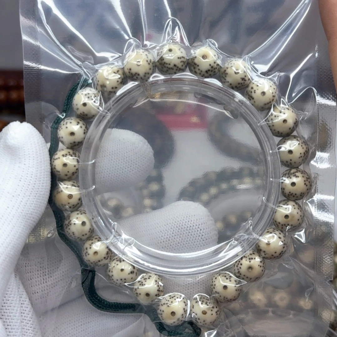 星月菩提吊坠1.0瓷白圆珠大眼睛同枝  手持