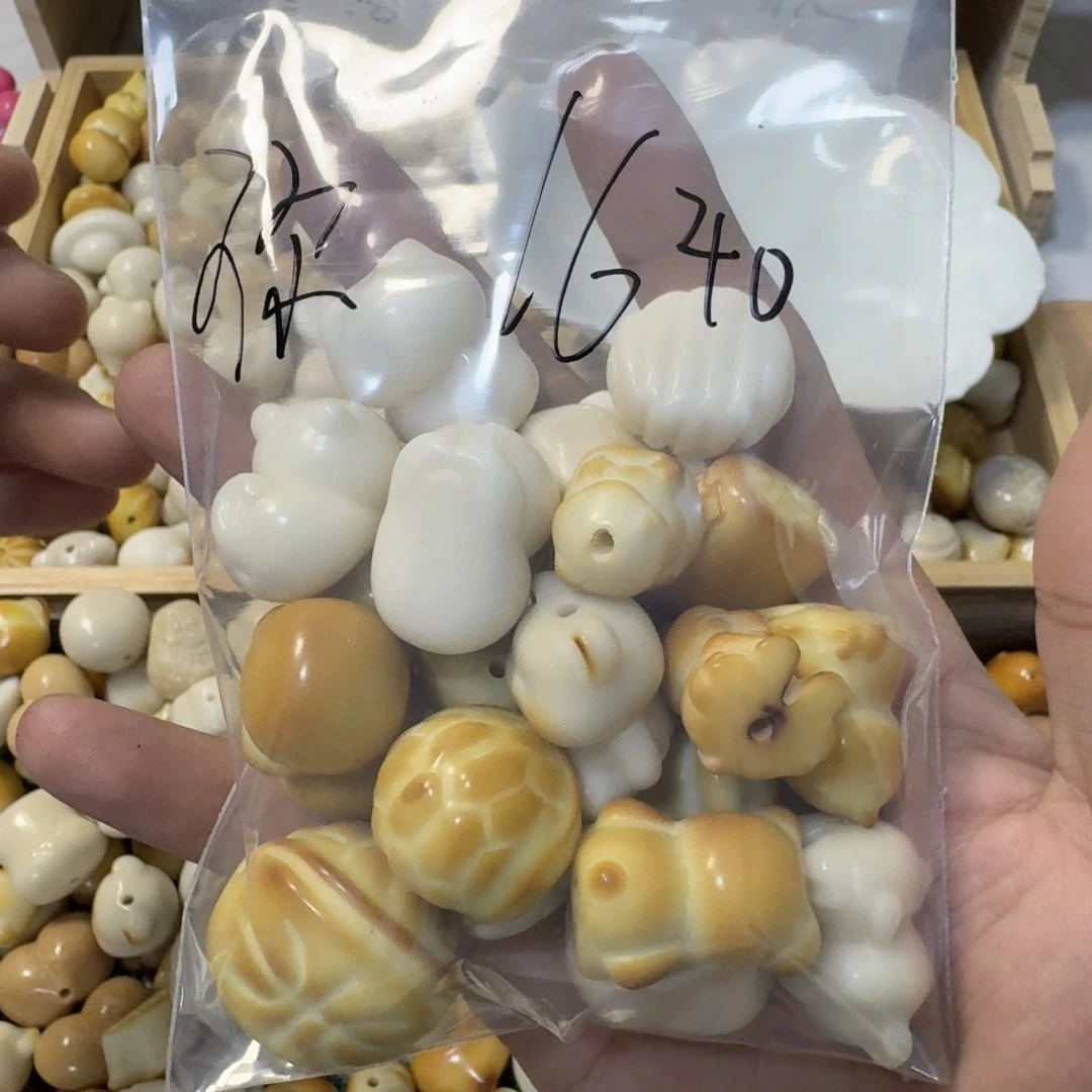 吊坠菩提根/象牙果你****0