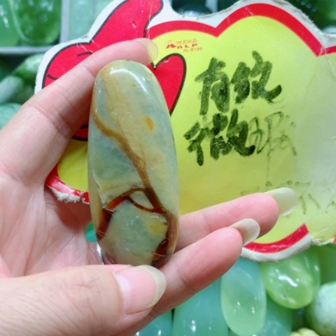 未镶嵌蛇纹石玉手把件