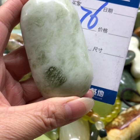 晴***里蛇纹石玉未镶嵌手把件