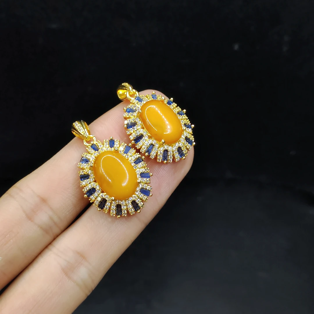 【老三珠宝】蜜蜡鸽子蛋面吊坠赠皮绳X9【多样性发其一】约14-10-4mm