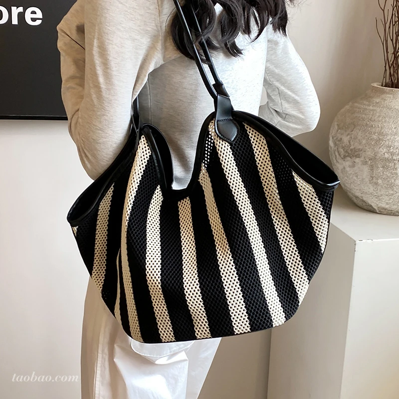 大容量镂空网布包包女2025新款通勤百搭单肩包夏季手提托特包xw