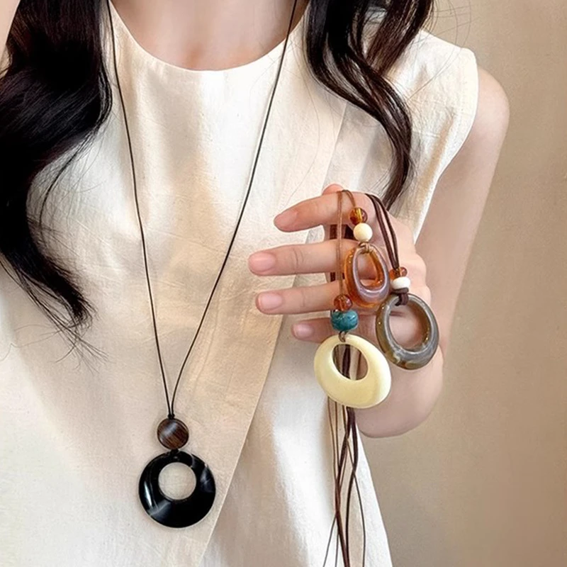 铜合金树脂吊坠圆环吊坠黑绳长款项链女简约百搭高级感毛衣链秋冬