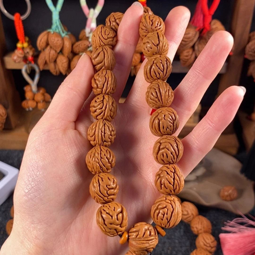 吊坠桃核桃枭手串