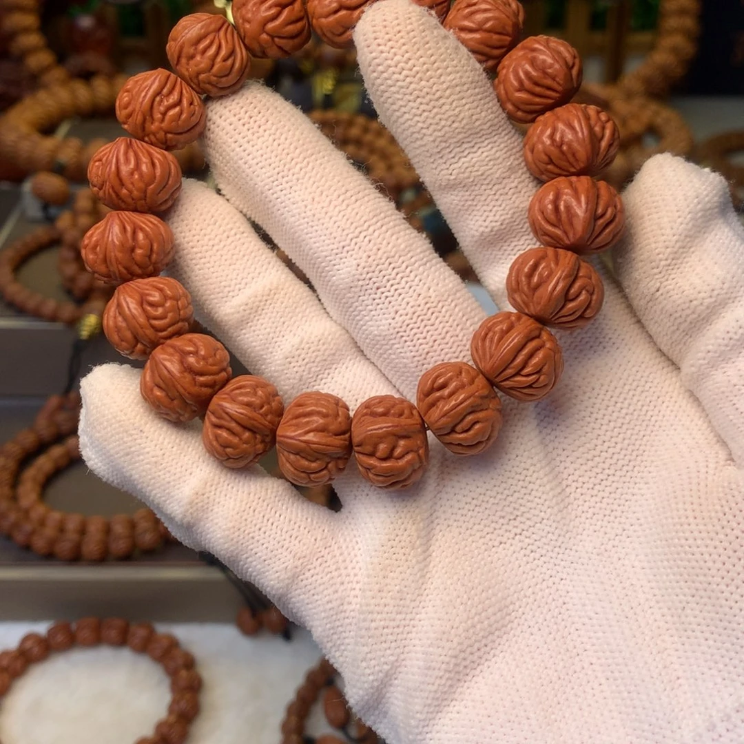 㿝***氼桃核手串秦岭龙纹