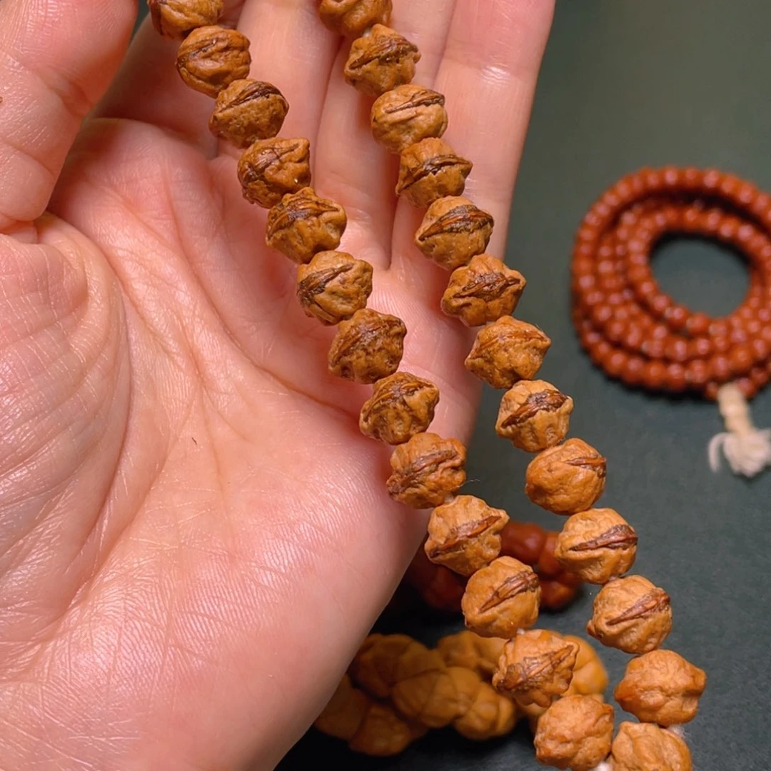 柏香籽/百香籽手串龅牙口手持