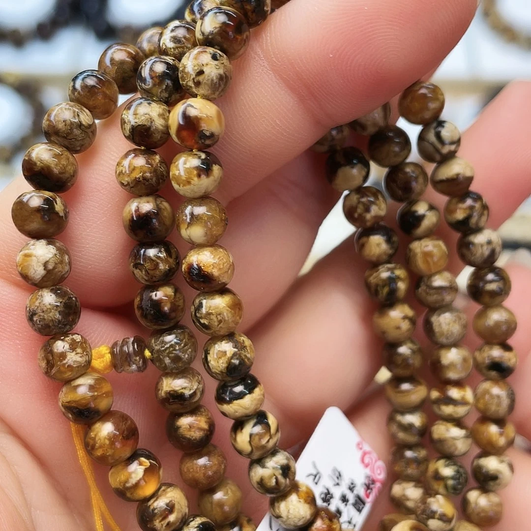 向***歌琥珀未镶嵌裸石六91240