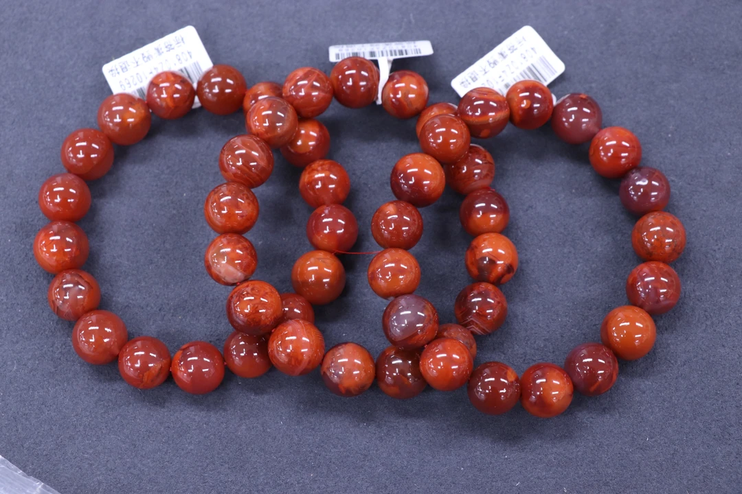 1原矿无优化天然南红玫红火焰纹单圈12mm左右多样发一串有纹裂