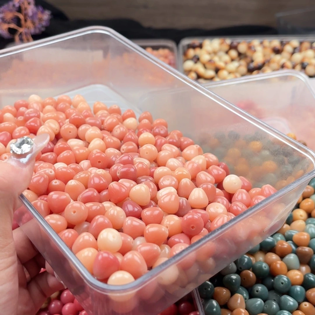 白玉菩提吊坠a12mm36颗。粉水滴