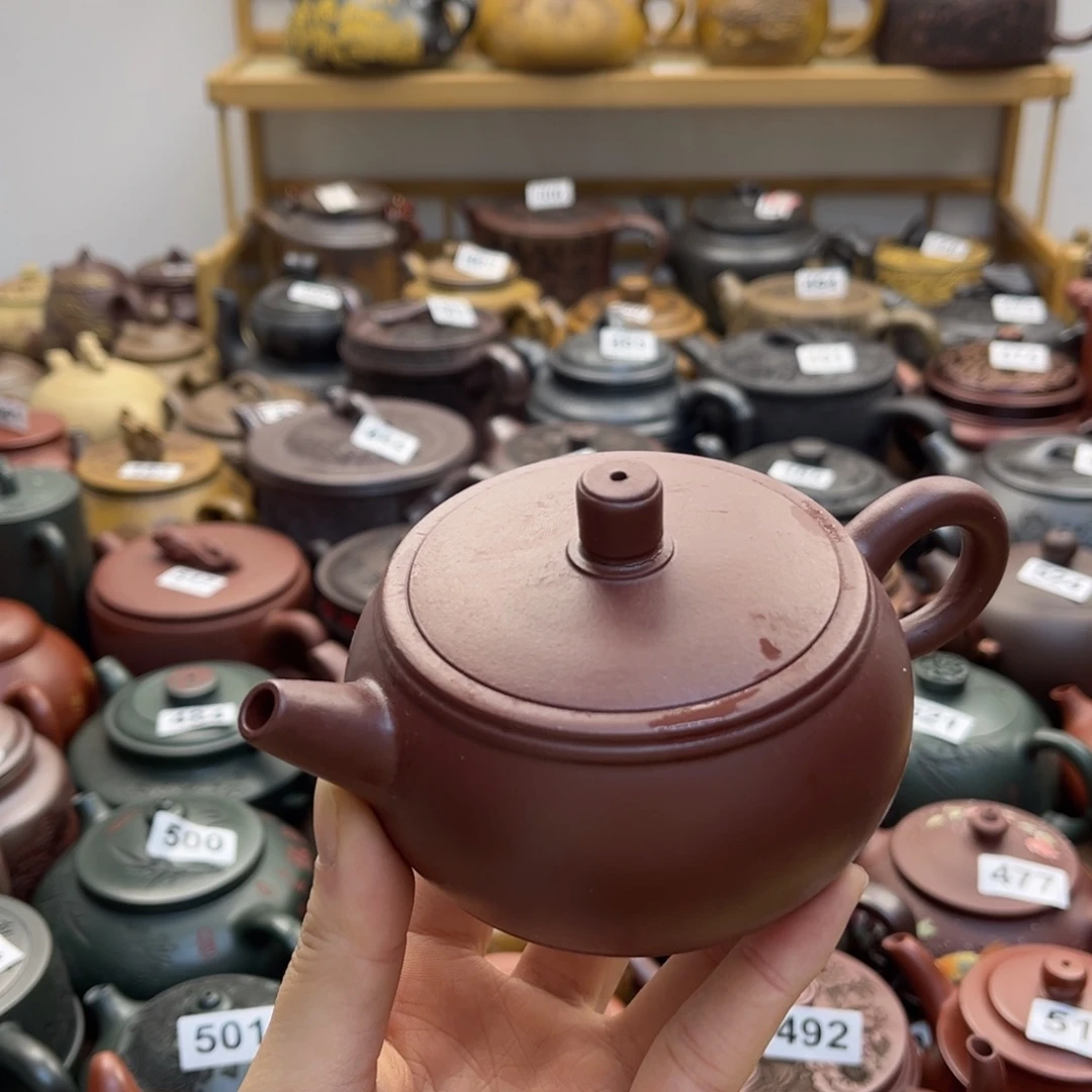 山***辉紫砂微瑕水注歪的