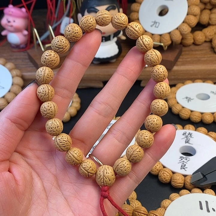 桃核手串陈*锳凤羽11  （尺寸误差0.5之间）