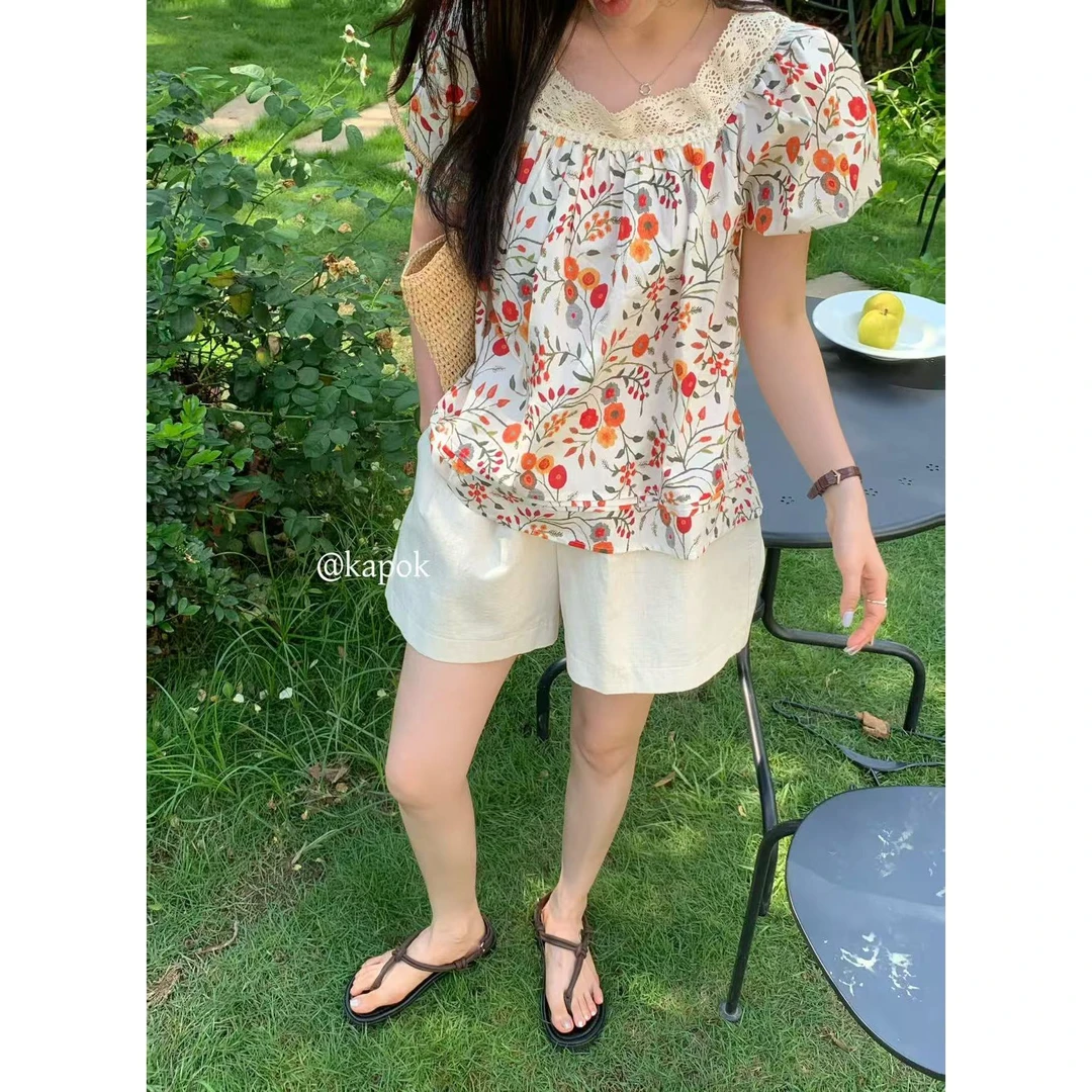 25272#KAPOK#韩系设计款蕾丝拼接翻领印花上衣(福利）