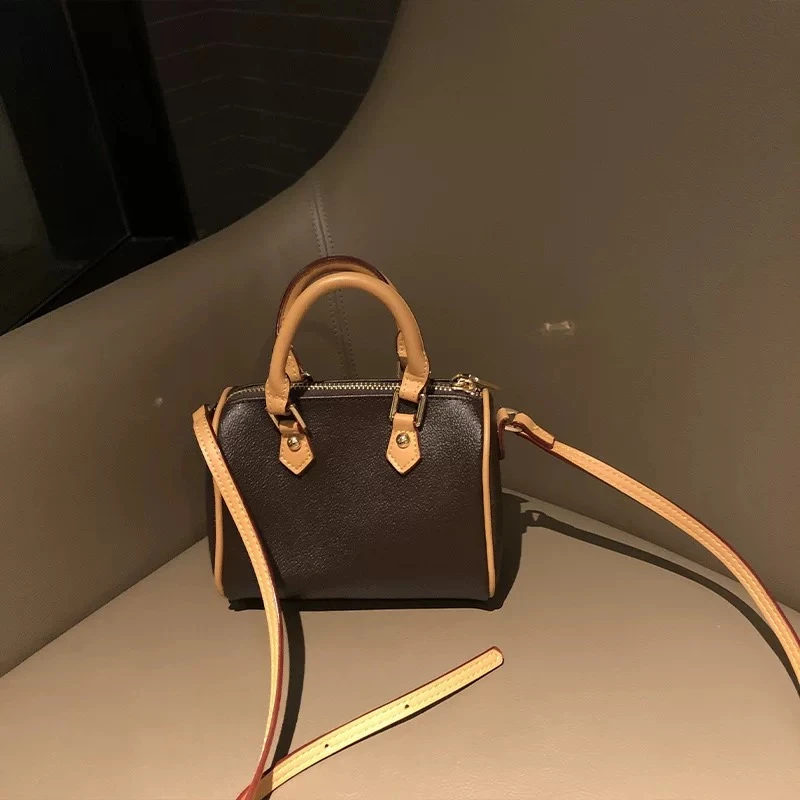 法国MK波士顿枕头包女2024新款高级感复古手提包包真皮单肩斜挎包