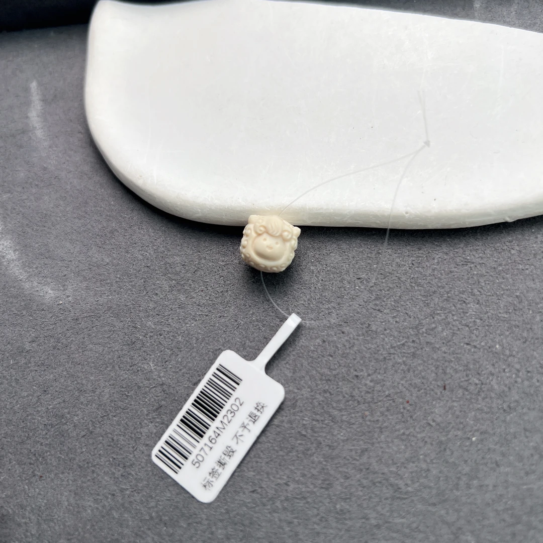 猛犸牙羊毛卷雕刻件