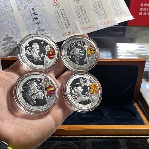纯银原盒证08年奥运第一组彩银套币如图
