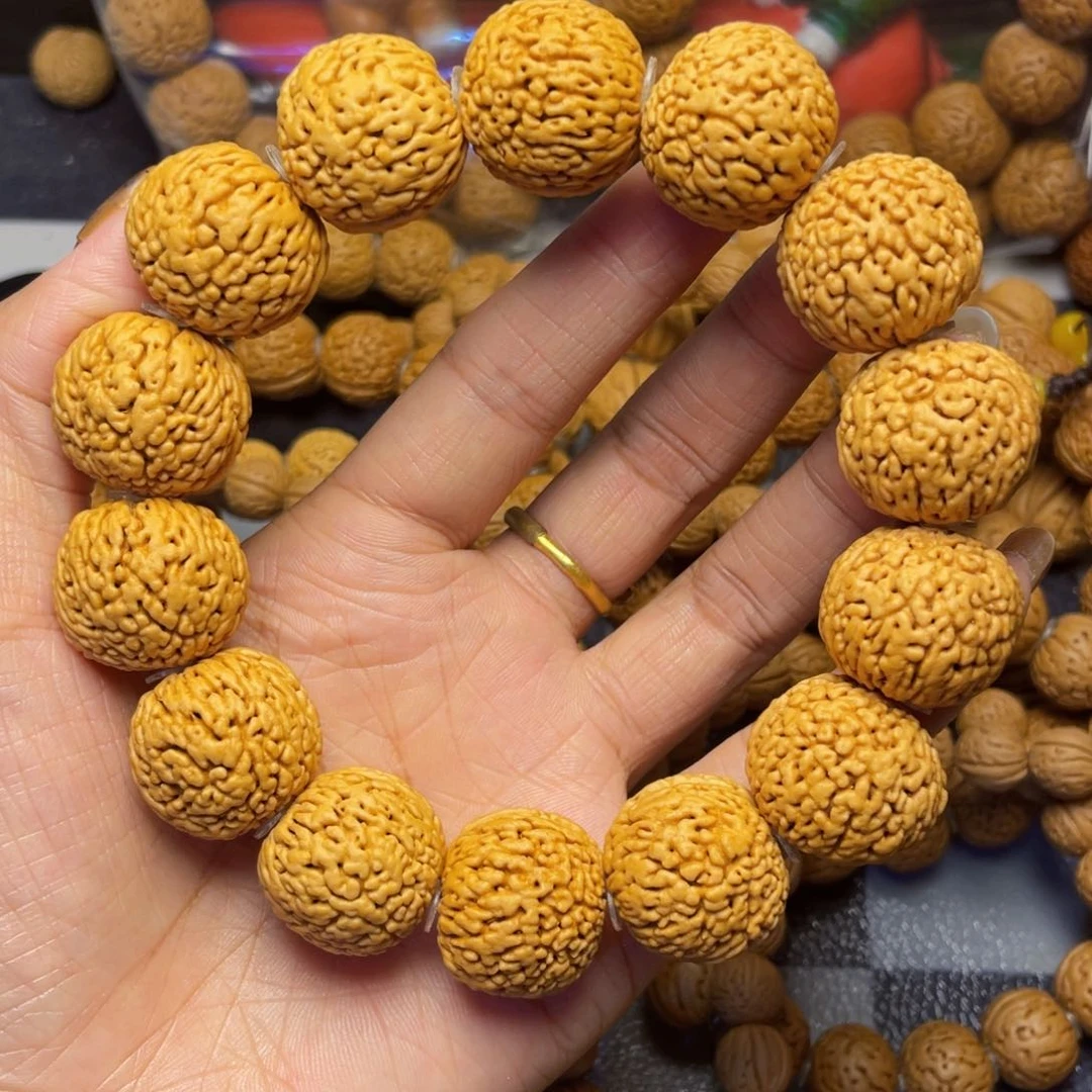 桃核吊坠21龙鳞凤尾手串