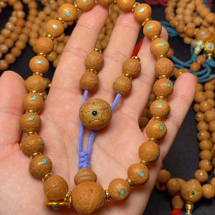 歡***囍凤眼菩提手串12+手持