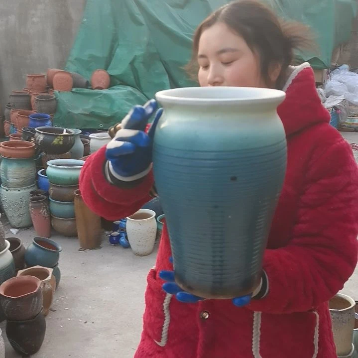 红陶口20高33瑕疵底裂