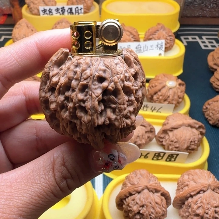 ?****?弯弯核桃打火机弯弯核桃大伙计