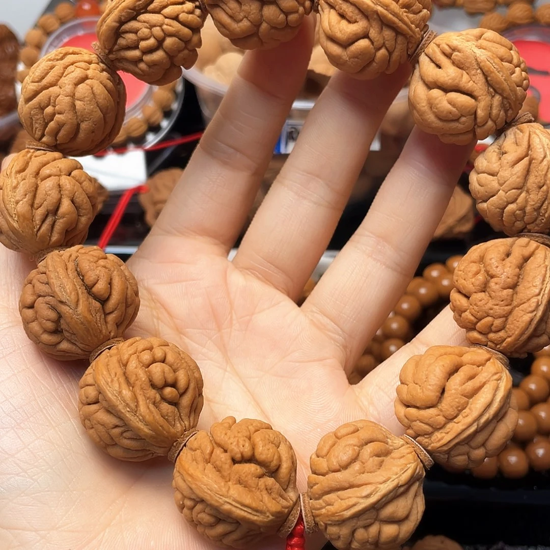 儒***心把件桃核霸王龙手持26➕尺寸13颗