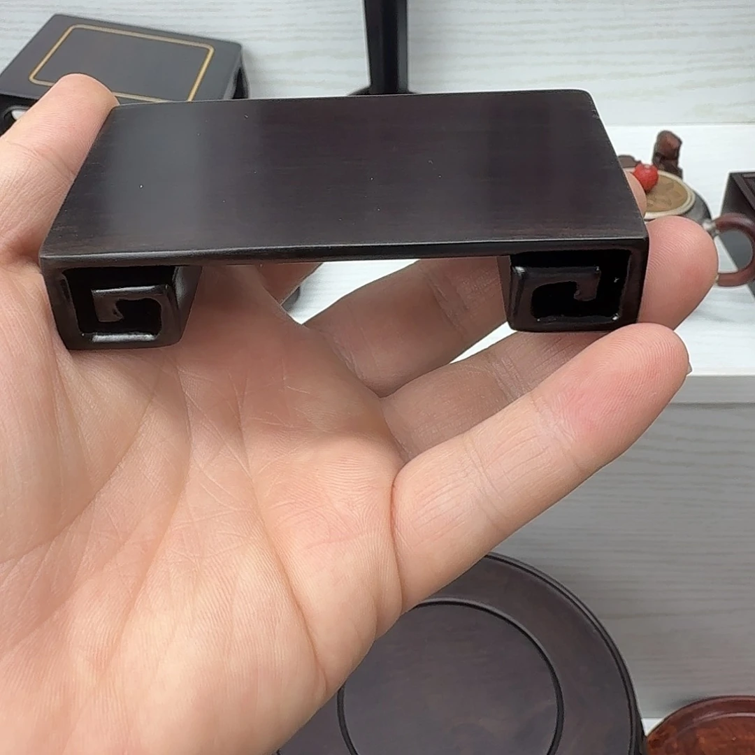 藤类紫光檀整木书卷底座