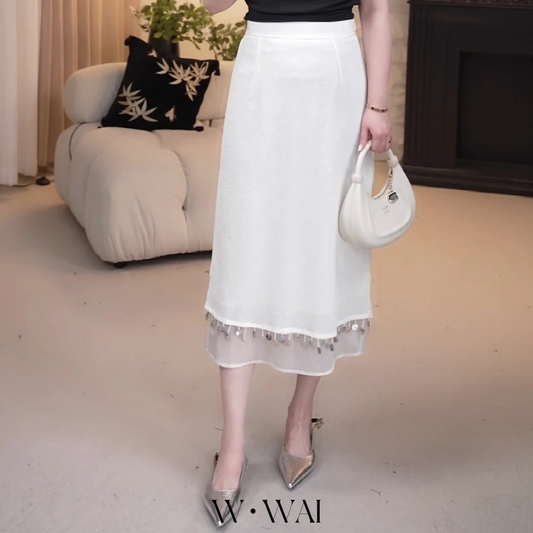 【晚风来信】显瘦亮片贝壳流苏拼接半裙 X52B455