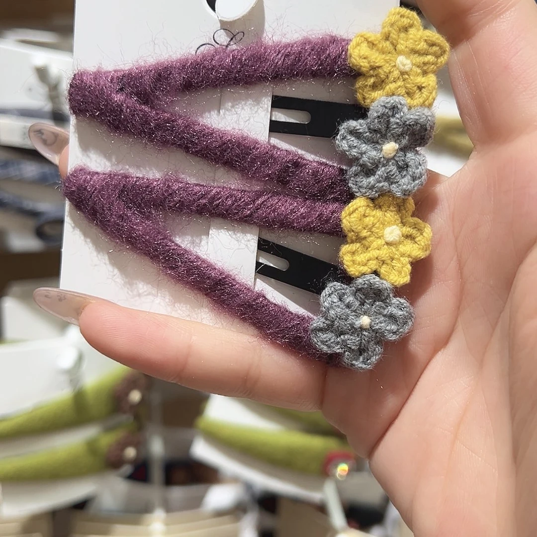 是****仿珍珠非金属花花紫色三角掰掰夹