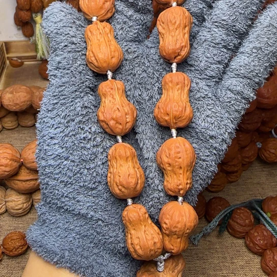 静***的吊坠文玩核桃花生手持