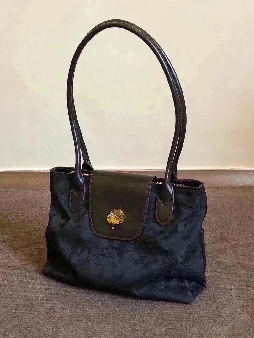 331到399复古女包