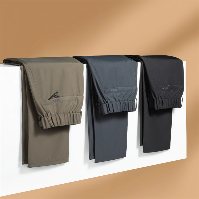 金盾户外防风休闲裤男款秋冬保暖直筒裤时尚百搭松紧长裤男裤子