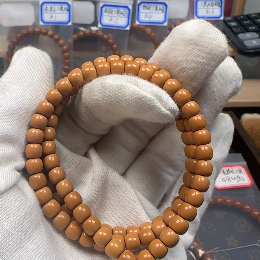 手串橄榄核老挝长串全无白6.2mm