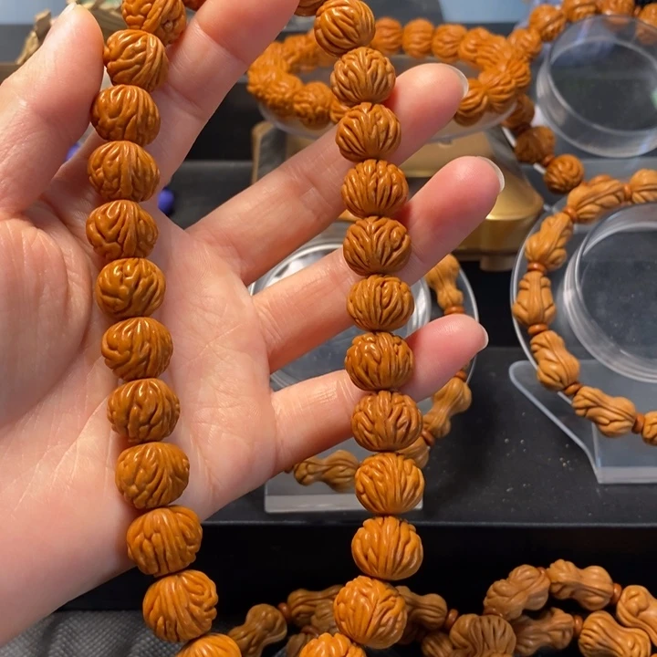 桃核手串凤羽金蟾13手持