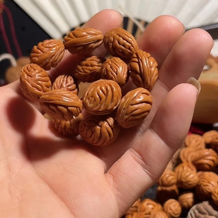 晶***宝碧桃核肌肉纹手串