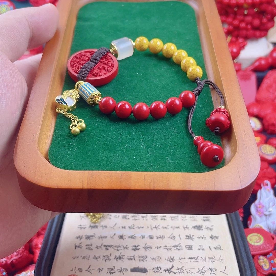 天然辰砂含辰砂工艺品山鬼花钱手绳