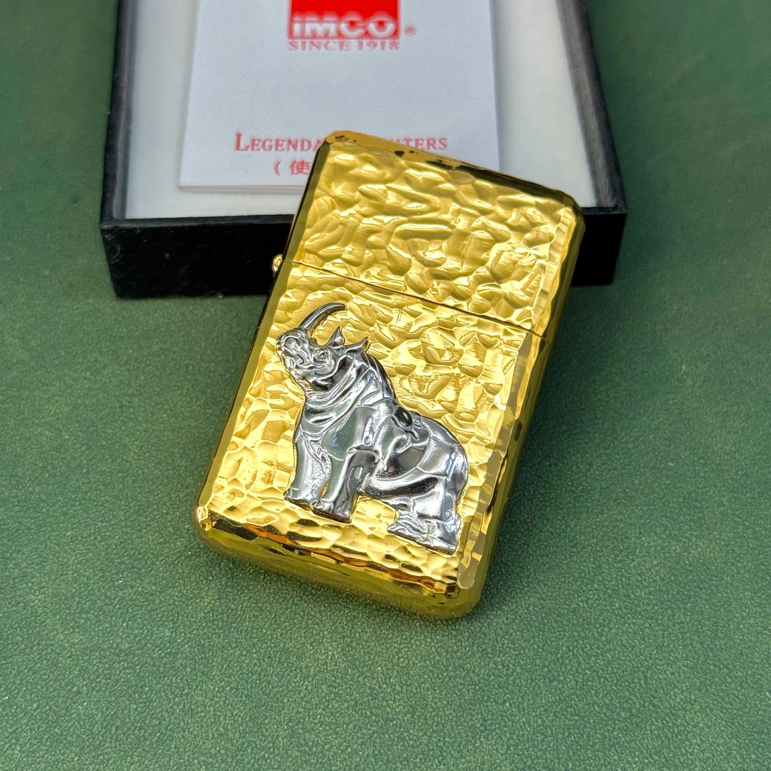 爱酷IMCO 3600镀金陨石坑纯银犀牛贴章 打火机