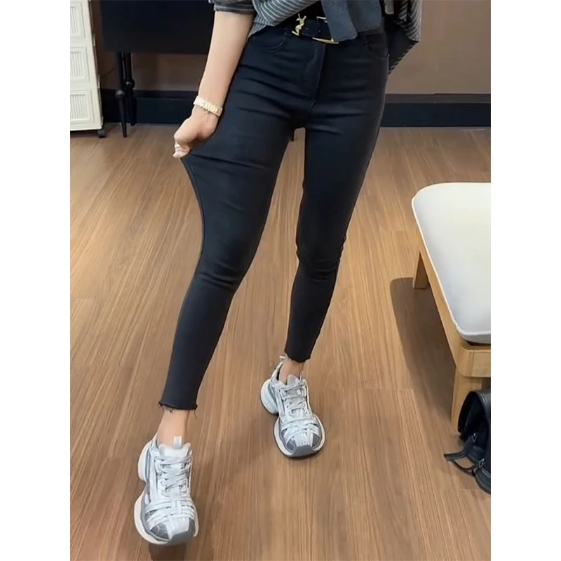 2025年秋季新款高腰毛边九分小脚牛仔裤女大码显瘦修身直筒铅笔裤