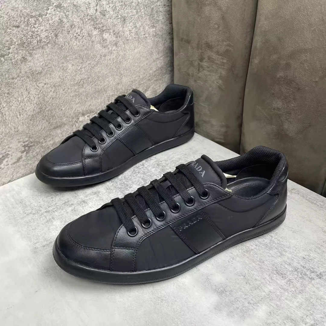 95新 Prada/普拉达 黑色尼龙面侧边压印logo时尚休闲板鞋/41.5码
