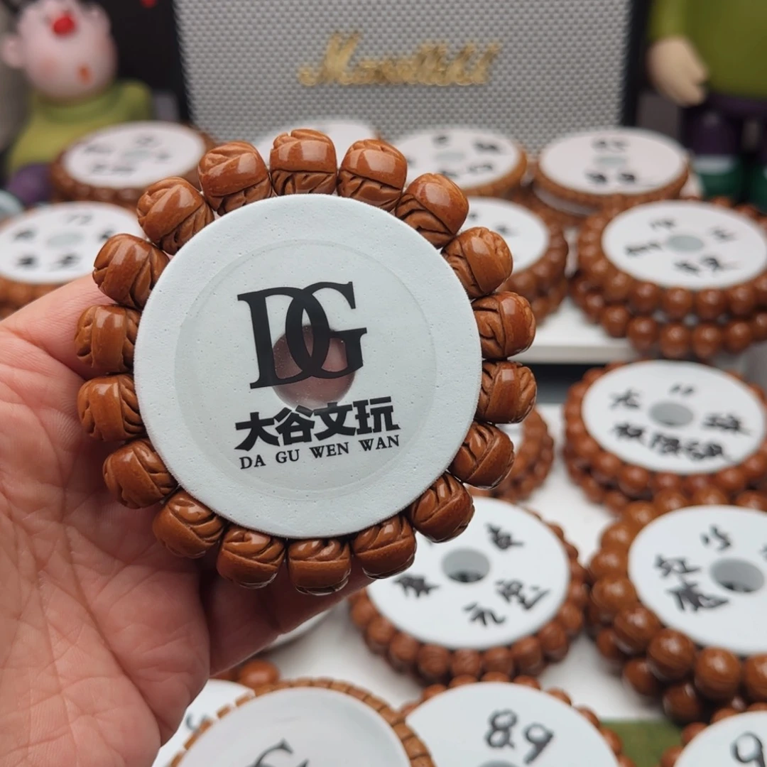 桃核吊坠东**张桃核手串