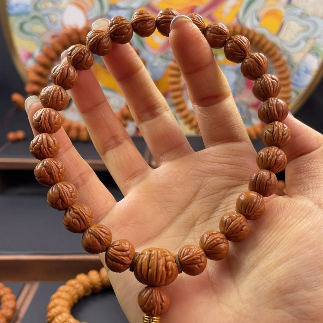 桃核手串1.1尺寸红魔玉龙脊手持
