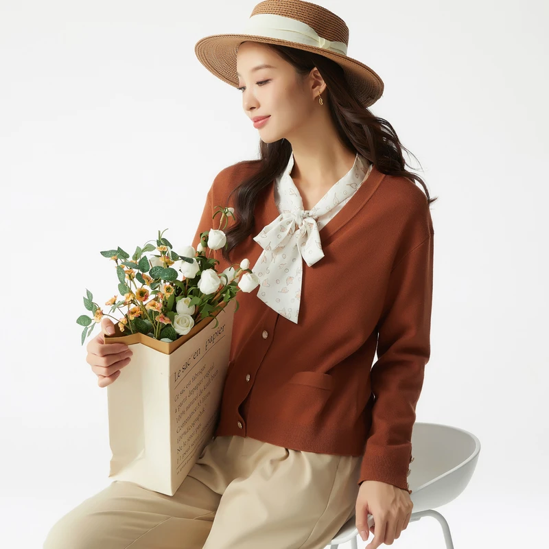 布景女2025年春季新品纯色珍珠扣针织开衫BW31EH1703