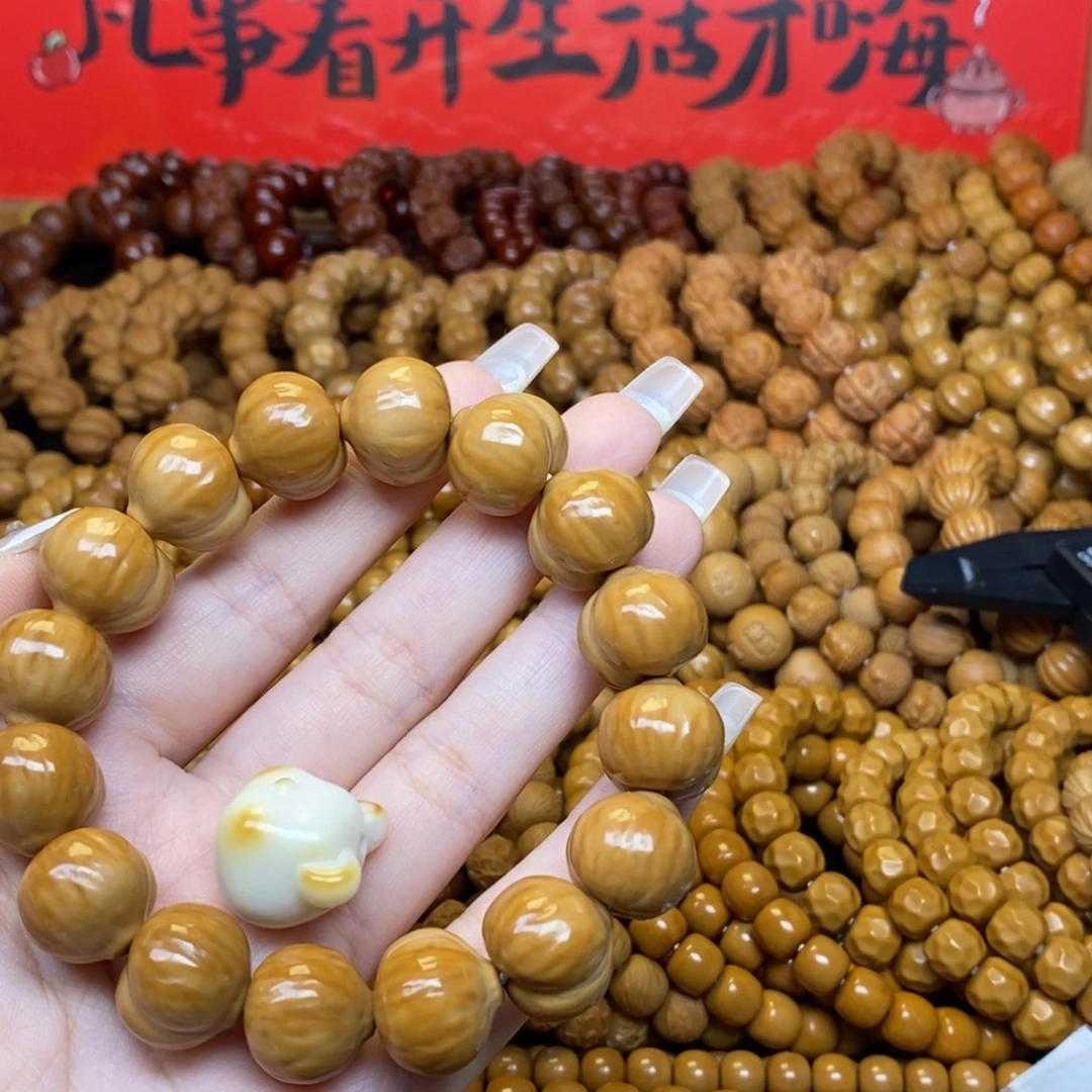 玥****吊坠猴头核桃猴头屁桃手串➕配饰